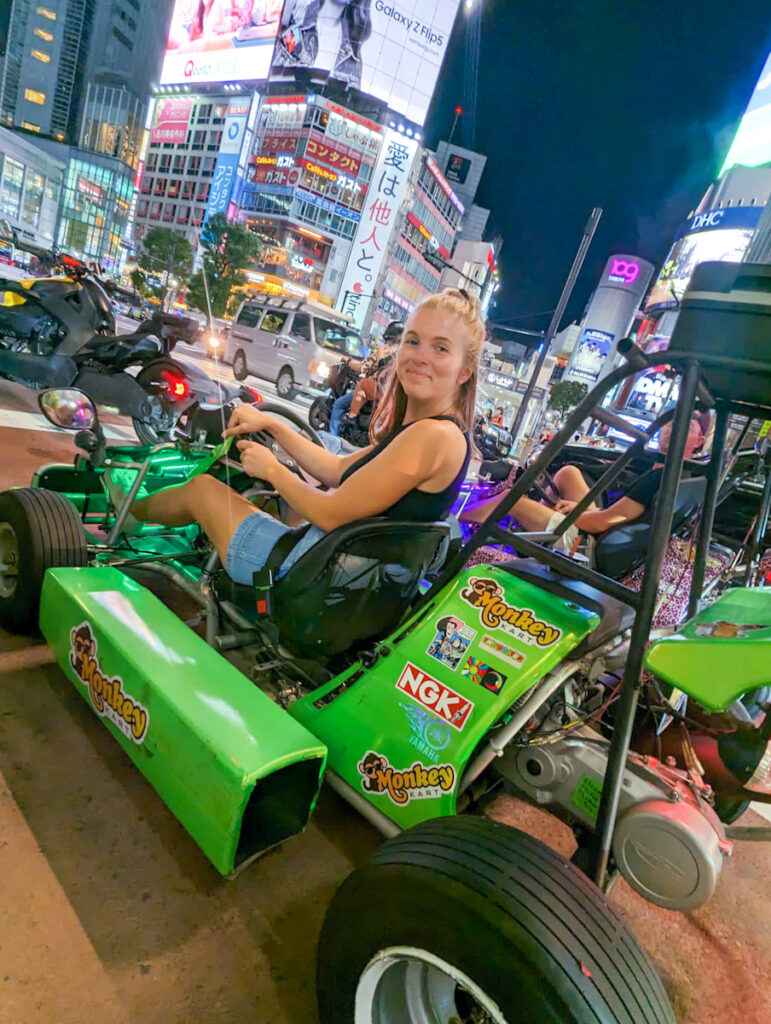 Me inside of a go kart in Shibuya crossing during my 10 day Japan itinerary.