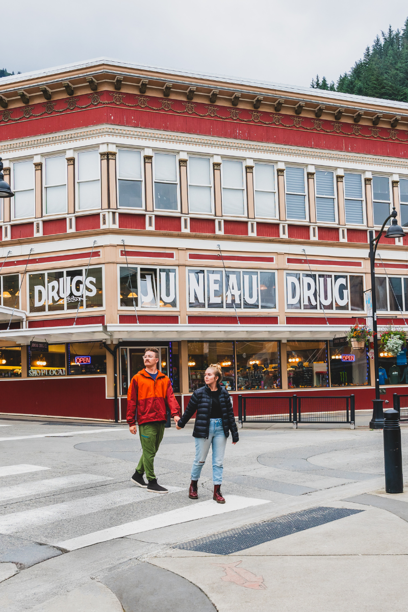 Jordyn and JT holding hands while crossing the street in juneau, alaska.