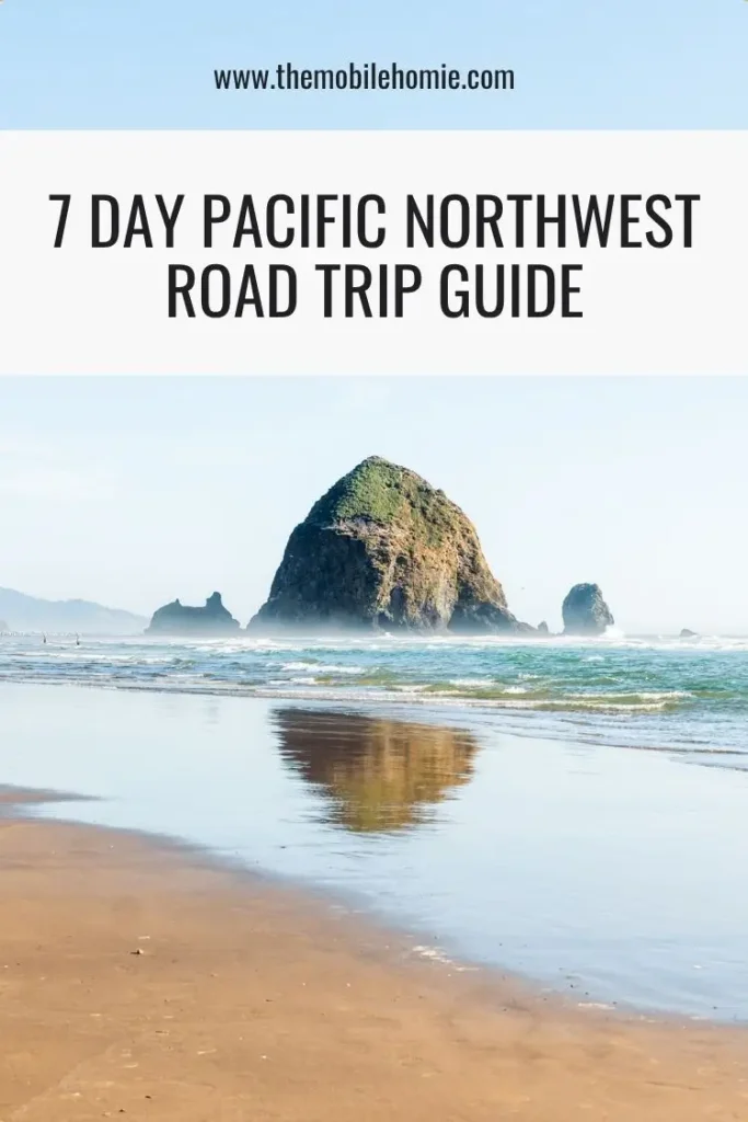 Cover image for a 7-day Pacific Northwest road trip guide featuring Haystack Rock at Cannon Beach, Oregon, with reflections on the wet sand and the title "7 Day Pacific Northwest Road Trip Guide."