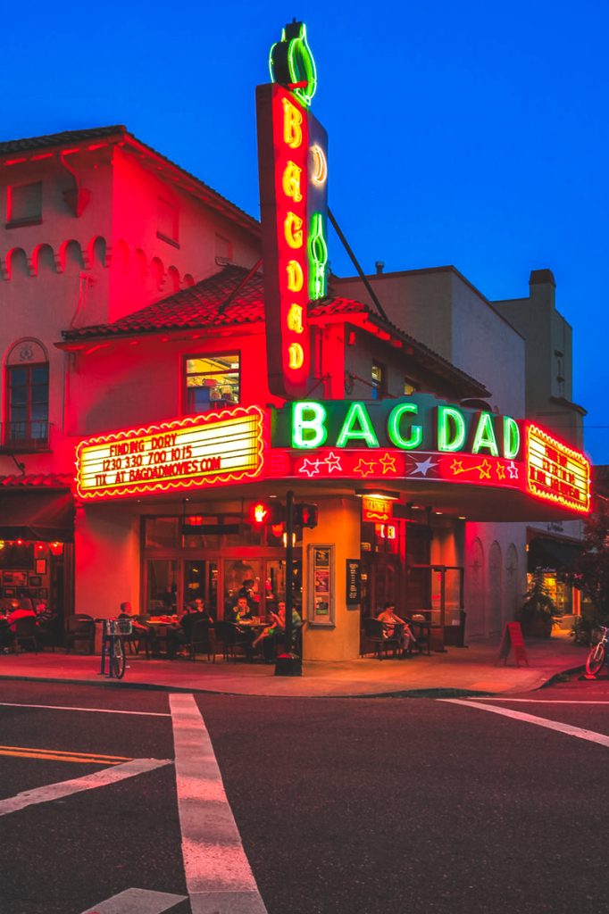 Neon lights of the historic Bagdad Theater on Hawthorne Boulevard in Portland at night featured in a 3 days in Portland Oregon itinerary